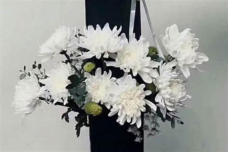 清明节上坟买花是女儿买还是儿子买